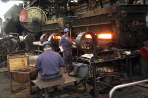 Men working in the forge shop