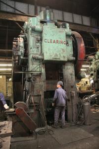 Men working in the forge shop